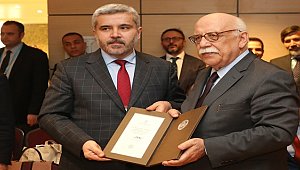 BAKAN AVCI’DAN REKTÖR ŞAHİN’E TEŞEKKÜR BERATI