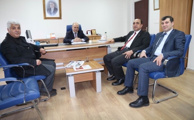 Nevzat Palta Tapu Müdürü Hayri Koç’u Ziyaret Etti