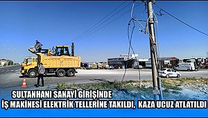 SULTANHANI İLÇESİNDE İŞ MAKİNESİ ELEKTRİK TELLERİNE TAKILDI